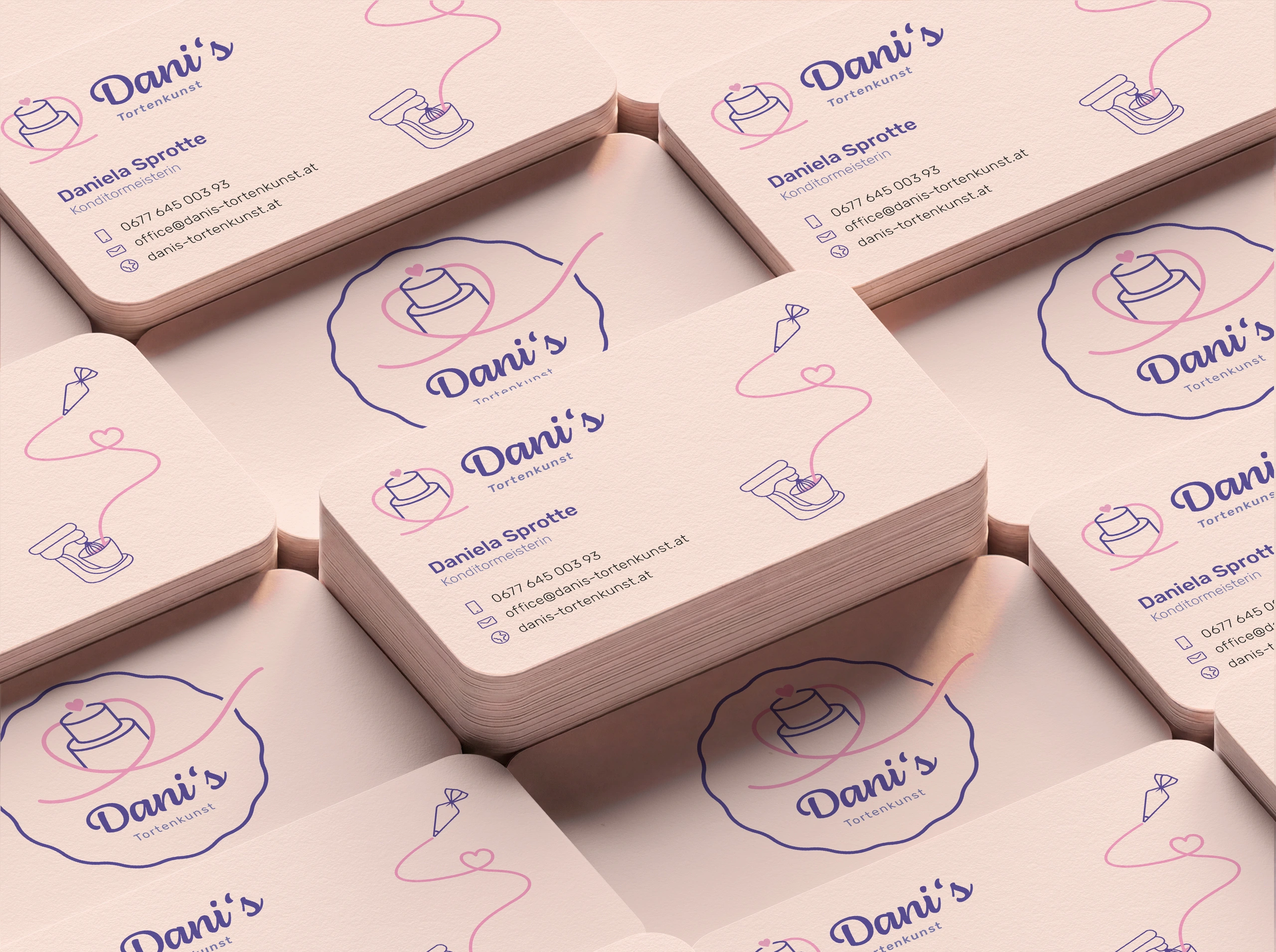 Dani's Tortenkunst business cards with logo pattern.